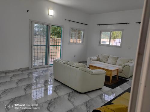 Χώρος καθιστικού στο SWEET HOME YENNE