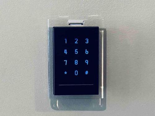 an alarm clock is attached to a wall at 504 Luxe 1BDR APT in center city in Philadelphia