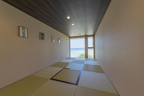 a room with a view of the ocean at Through Time Amami - Vacation STAY 58444v in Amami