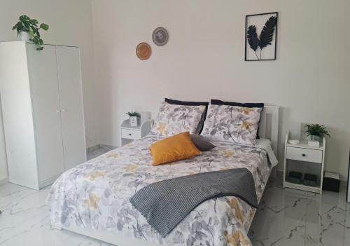 Katil atau katil-katil dalam bilik di Deluxe B&B "Casa Alegria", Tarrafal