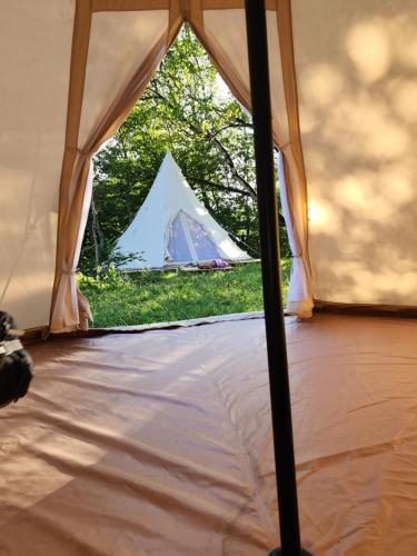a tent with a view of a tent at Karavani in Ambrolauri