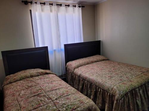 Postel nebo postele na pokoji v ubytování Torotoro Hostal El Olvido