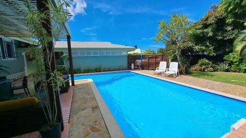 Swimmingpoolen hos eller tæt på TAHITI - Villa Fara