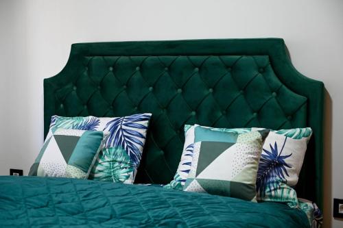 Un pat sau paturi într-o cameră la Apartman Andric Zlatibor