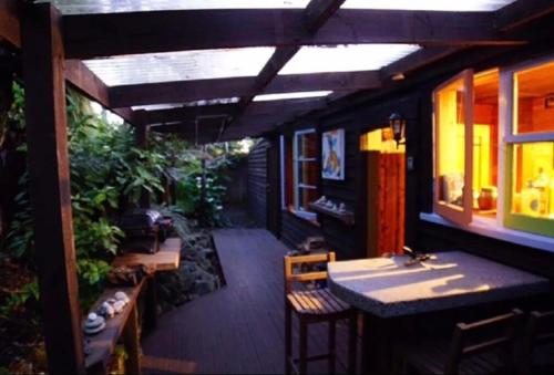 Reštaurácia alebo iné gastronomické zariadenie v ubytovaní Classic Kiwi bach