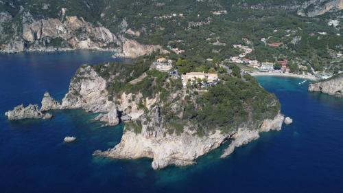 an aerial view of an island in the water at Tzeris House in Doukádes