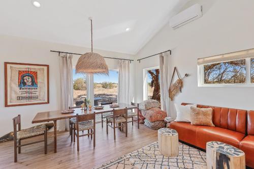 a living room with a couch and a table at The Grand Canyon Headquarters in Valle