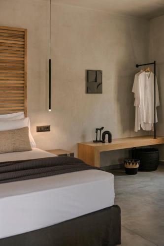 Кровать или кровати в номере Lanolia - Olea Di Assos Villas