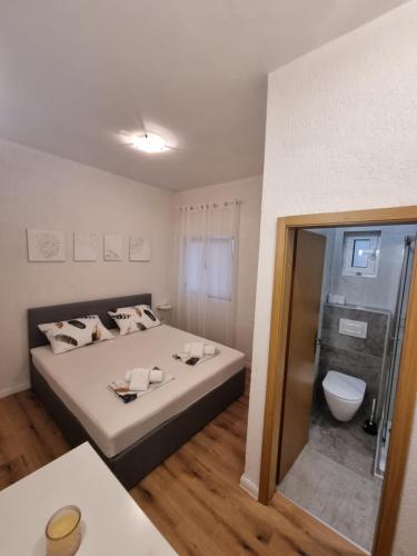 Vannituba majutusasutuses Apartman Lucia