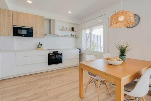 Una cocina o zona de cocina en BA Primera Linea Neptuno