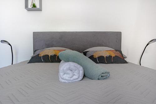 Katil atau katil-katil dalam bilik di Le pied à terre d'ernest