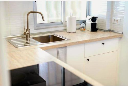Kuchyň nebo kuchyňský kout v ubytování Ocean View Penthouse