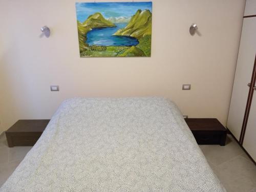 Postel nebo postele na pokoji v ubytování Casa di Ariel