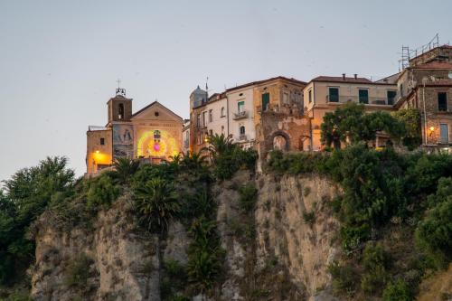 a group of buildings on top of a mountain at Don Antonio Rooms in Agropoli
