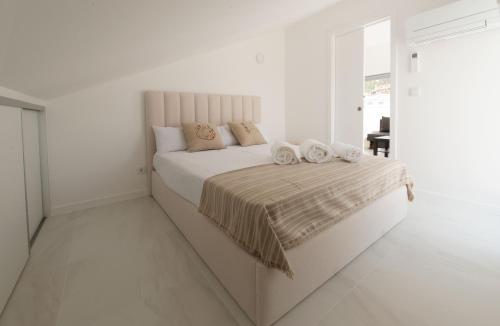 Ένα ή περισσότερα κρεβάτια σε δωμάτιο στο Sun House - Alojamento Local - Ponte de Lima
