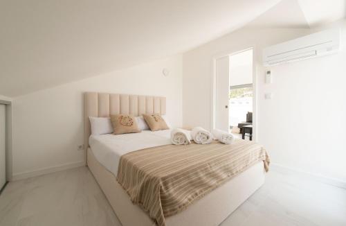 Ένα ή περισσότερα κρεβάτια σε δωμάτιο στο Sun House - Alojamento Local - Ponte de Lima