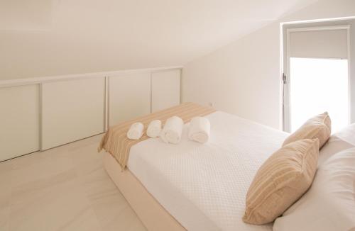 Ένα ή περισσότερα κρεβάτια σε δωμάτιο στο Sun House - Alojamento Local - Ponte de Lima