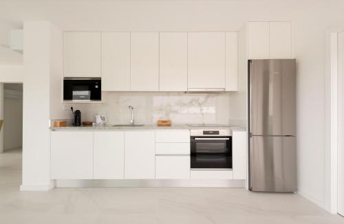 Η κουζίνα ή μικρή κουζίνα στο Sun House - Alojamento Local - Ponte de Lima