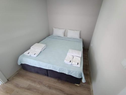 Tempat tidur dalam kamar di Termessos Villa's