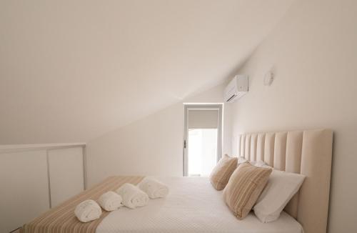 Ένα ή περισσότερα κρεβάτια σε δωμάτιο στο Sun House - Alojamento Local - Ponte de Lima