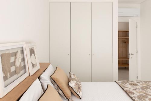 Ένα ή περισσότερα κρεβάτια σε δωμάτιο στο Sun House - Alojamento Local - Ponte de Lima