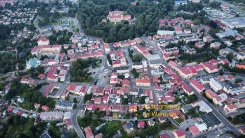 an overhead view of a city with houses and roads at Apartament Gościnny in Łańcut