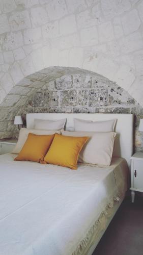 Postel nebo postele na pokoji v ubytování Scardino Trulli