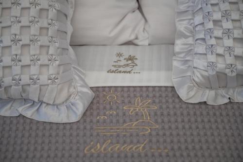 a close up of the bottom of a bed at Island house in Psakoudia