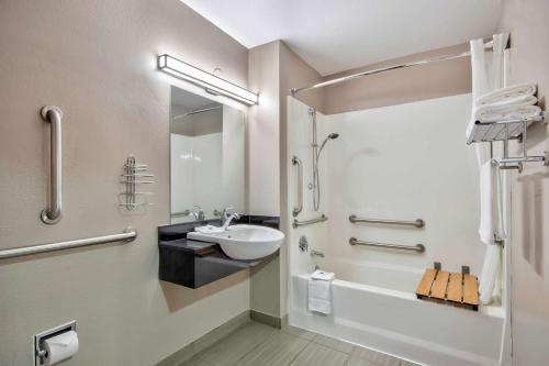 a bathroom with a sink and a toilet and a shower at Studio 6-Austin, TX - Midtown in Austin