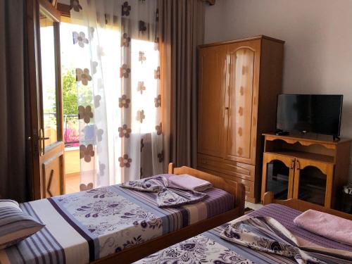 Postel nebo postele na pokoji v ubytování Camping & Guest House Herges