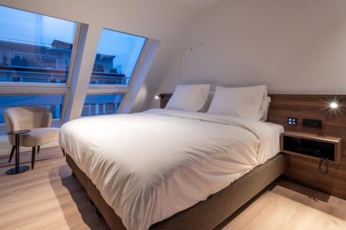 Letto o letti in una camera di ONE TWO FOUR - Hotel & Spa