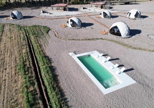 an overhead view of tents and a swimming pool at Cinco Cumbres in Uspallata