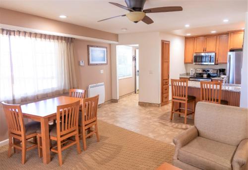 a kitchen and dining room with a table and chairs at The Tahoe Beach & Ski Club Owners Association in South Lake Tahoe