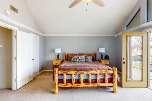 a bedroom with a bed and a ceiling fan at The Mystic in Livingston