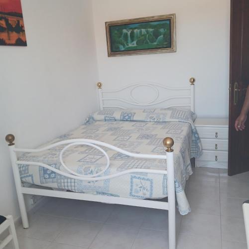 Ένα ή περισσότερα κρεβάτια σε δωμάτιο στο Homem de Ferro