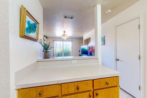 a kitchen with a counter and a window at It's Always Sunny in Killeen in Killeen