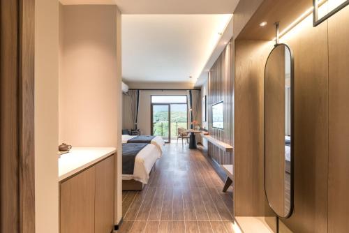Fotografie z fotogalerie ubytování Mountain Tree Hotel Huizhou Longmen v destinaci Longmen