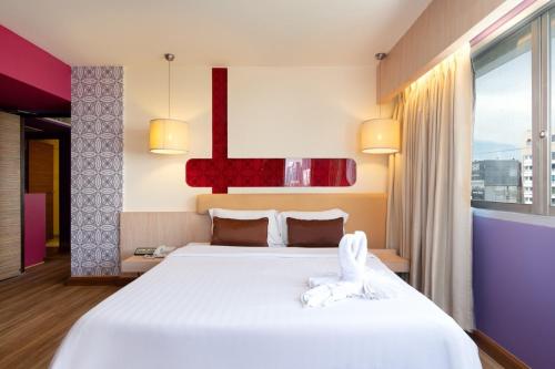 Postel nebo postele na pokoji v ubytování Veronica Residence