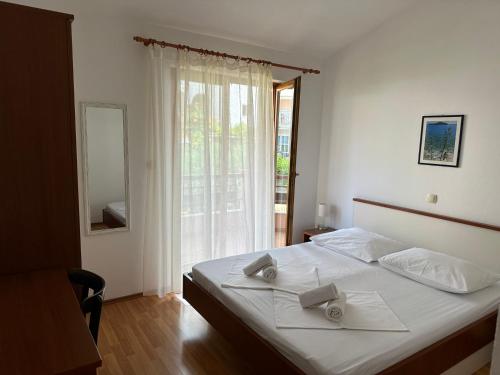 Posteľ alebo postele v izbe v ubytovaní Apartment Vesela 2