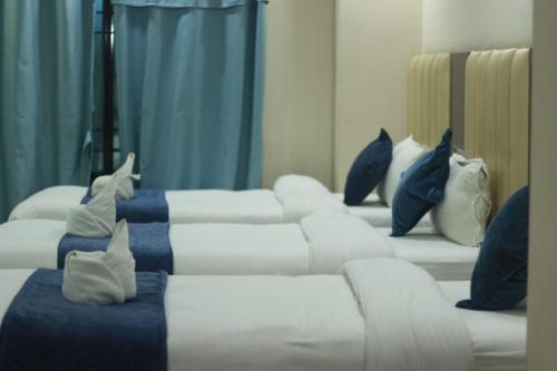 Postel nebo postele na pokoji v ubytování Hotel Sara PVT LTD