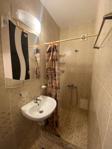 Ένα μπάνιο στο Stella Polaris 1 Apartments