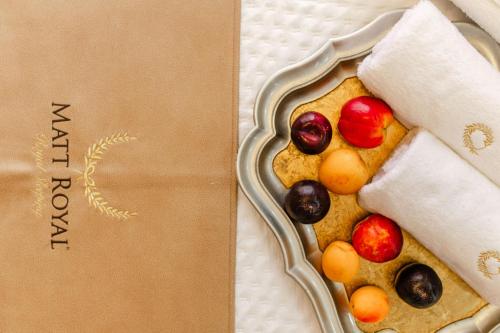 a plate of food with fruit on top of it at PELAGIO APARTMENT 1 in Alexandroupoli