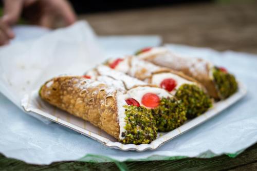 a plate with some food on top of a table at Dammuso Almendra in Scicli