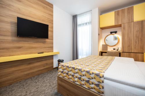 Ένα ή περισσότερα κρεβάτια σε δωμάτιο στο Planinka