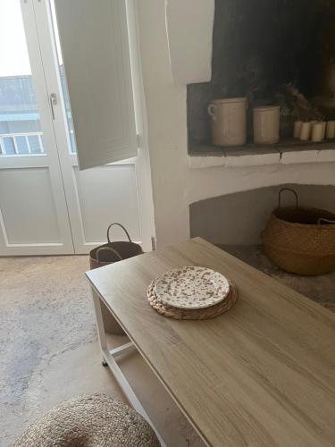 a pizza sitting on top of a table at L’Edicola Votiva in Casarano