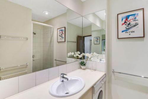 a bathroom with a sink and a mirror at MarkII 4 West in Mount Buller