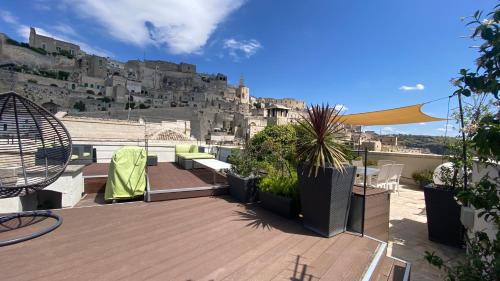 a balcony with a view of a city at Terrazza Casa Mia Matera in Matera