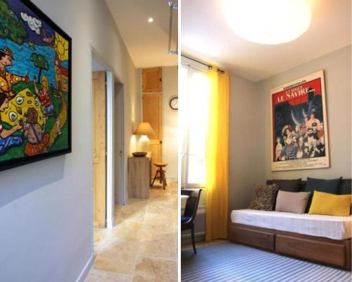 a living room with a couch and a painting on the wall at Les Cachettes in Avignon