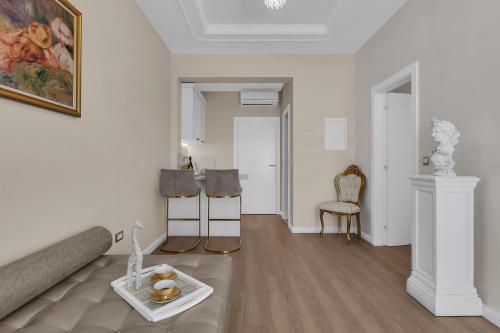 a living room with a couch and a table at Apartment Vranješ in Makarska