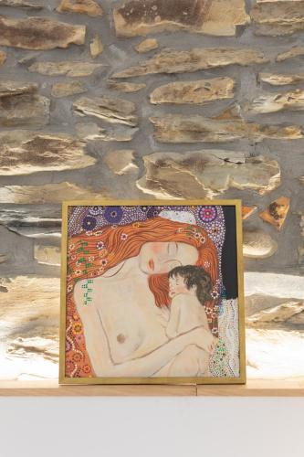 a picture of a couple on a wall at Zutabe - baskeyrentals in Azpeitia